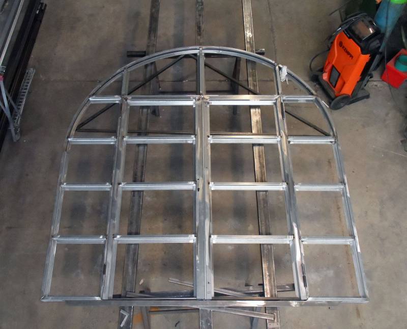 Réalisation sur-mesure d’une porte en menuiserie acier Jansen à rupture de pont thermique