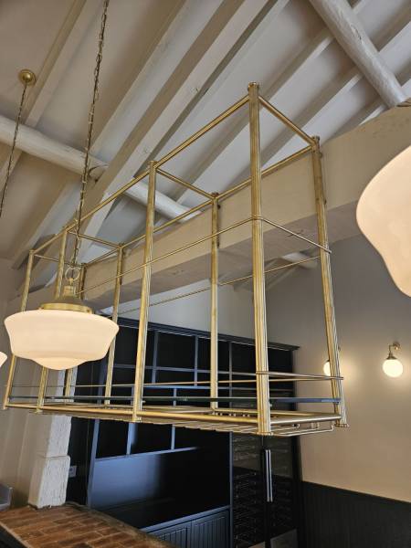 Pose d'un ciel de bar en laiton près de Lyon